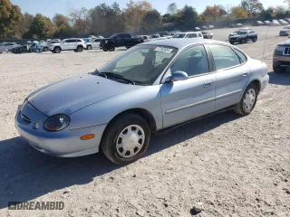 1998 Ford Taurus LX with VIN 1FAFP52U5WA273382, listed as a Copart auction lot 77102854 with 73,014 mi miles and Salvage Title. Bid and sale history available at carsss.com. Image 1.