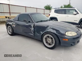 2001 Mazda MX-5 Miata with VIN JM1NB353210210976, listed as a Copart auction lot 59653695 with 152,250 mi miles and Salvage title. Bid and sale history available at DreamBid. Image 4.