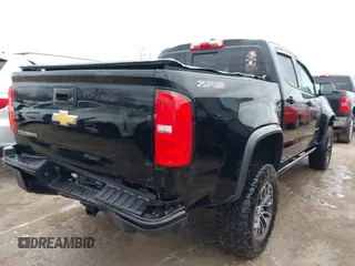 2018 Chevrolet Colorado 4WD ZR2 with VIN 1GCGTEEN9J1173647, listed as a IAAI auction lot 42016015 with 102,041 mi miles. Bid and sale history available at carsss.com. Image 4.