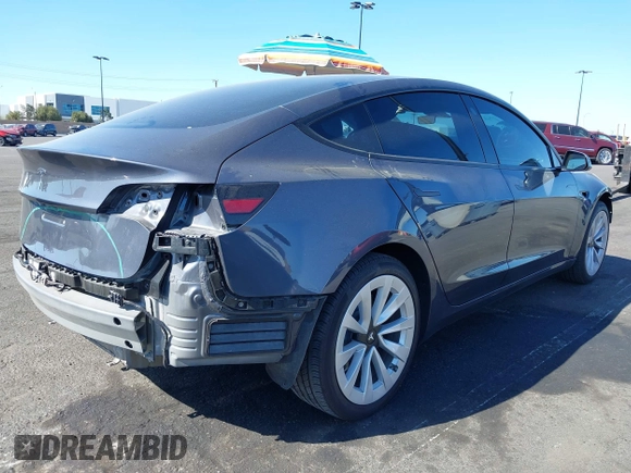 2023 Tesla Model 3 with VIN 5YJ3E1EA2PF640289, listed as a IAAI auction lot 42000200 with 14,194 mi miles and . Bid and sale history available at DreamBid. Image 4.
