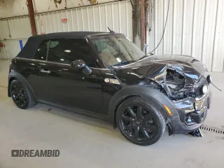 2012 MINI Convertible S с VIN WMWZP3C51CT296318, выставлен на аукционе Copart как лот 47701405 с пробегом 78 842 миль миль и Списание • Salvage title. История ставок и продаж доступна на DreamBid. Изображение 4.