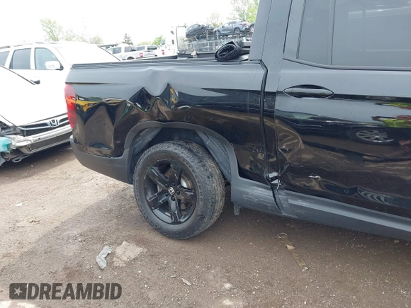 2023 Honda Ridgeline Black Edition with VIN 5FPYK3F83PB023481, listed as a IAAI auction lot 42157928 with 24,632 mi miles and . Bid and sale history available at DreamBid. Image 6.