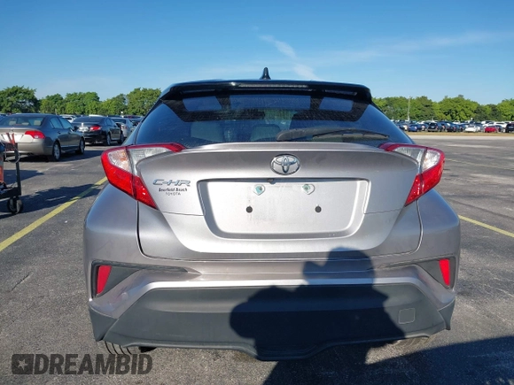 2019 Toyota C-HR XLE with VIN NMTKHMBX4KR082574, listed as a IAAI auction lot 41694921 with 61,777 mi miles and . Bid and sale history available at DreamBid. Image 16.