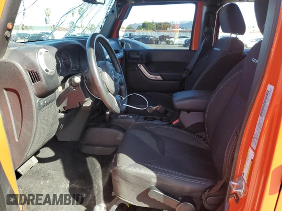 2015 Jeep Wrangler Unlimited Rubicon with VIN 1C4BJWFG7FL719038, listed as a Copart auction lot 51507205 with 62,664 mi miles and Salvage Title. Bid and sale history available at carsss.com. Image 7.