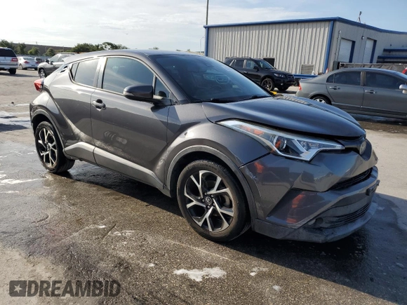 2018 Toyota C-HR XLE with VIN NMTKHMBX9JR048242, listed as a Copart auction lot 62730415 with 82,061 mi miles and Salvage title. Bid and sale history available at DreamBid. Image 4.