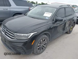 2023 Volkswagen Tiguan S z VIN 3VVRB7AX4PM046851, wystawiony jako IAAI lot #42039811 z przebiegiem 44 985 mil mil oraz . Historia ofert i sprzedaży dostępna na DreamBid. Obrazek 18.