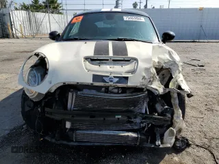 2013 MINI Coupe S z VIN WMWSX3C59DT466931, wystawiony jako Copart lot #75463804 z przebiegiem Nie podano mil oraz Szkody całkowita. Historia ofert i sprzedaży dostępna na DreamBid. Obrazek 5.