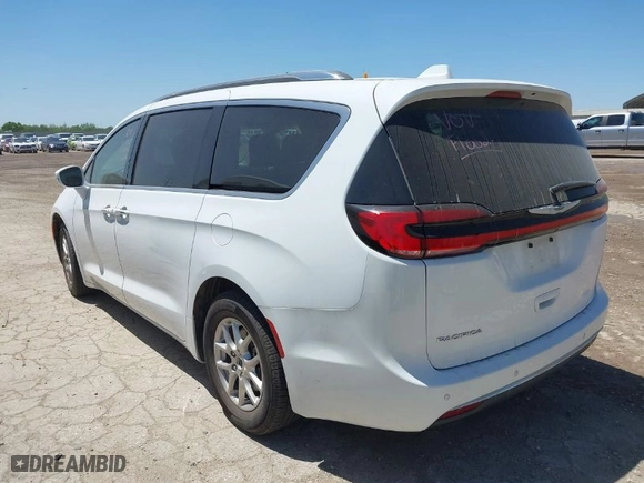 2021 Chrysler Pacifica Touring L with VIN 2C4RC1BG2MR598201, listed as a IAAI auction lot 41973569 with 55,861 mi miles. Bid and sale history available at carsss.com. Image 3.
