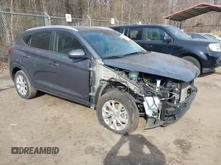2019 Hyundai Tucson Value z VIN KM8J3CA48KU051221, wystawiony jako IAAI lot #41775232 z przebiegiem 64 337 mil mil oraz . Historia ofert i sprzedaży dostępna na DreamBid. Obrazek 1.