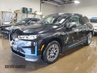 2022 BMW iX xDrive50 with VIN WB523CF08NCK62892, listed as a Copart auction lot 48244725 with 22,690 mi miles and Salvage Title. Bid and sale history available at carsss.com. Image 1.