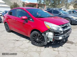 2016 Kia Rio EX with VIN KNADN4A37G6586820, listed as a IAAI auction lot 41948092 with 107,497 mi miles. Bid and sale history available at carsss.com. Image 1.