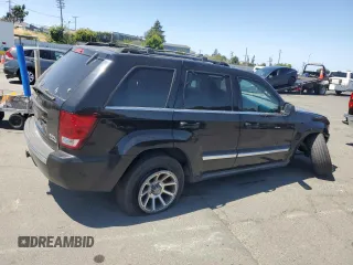 2005 Jeep Grand Cherokee Limited with VIN 1J8HR58265C699077, listed as a Copart auction lot 58490185 with 163,280 mi miles and Salvage title. Bid and sale history available at DreamBid. Image 3.