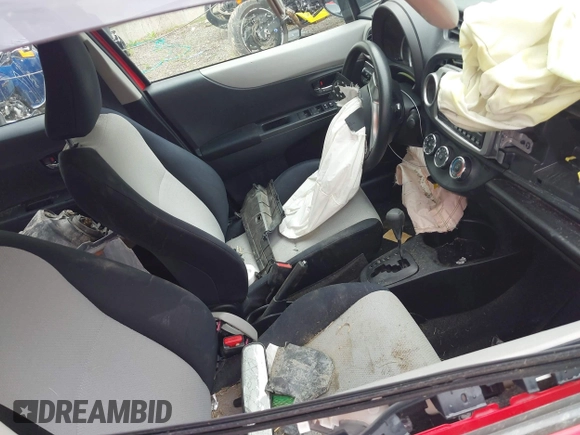 2012 Toyota Yaris L with VIN JTDKTUD32CD513940, listed as a IAAI auction lot 42167466 with 108,407 mi miles and . Bid and sale history available at DreamBid. Image 5.