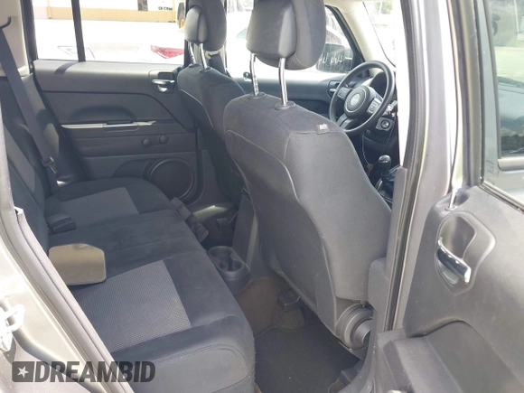 2014 Jeep Patriot Sport with VIN 1C4NJPBA5ED559951, listed as a IAAI auction lot 42802286 with 171,487 mi miles and . Bid and sale history available at DreamBid. Image 8.