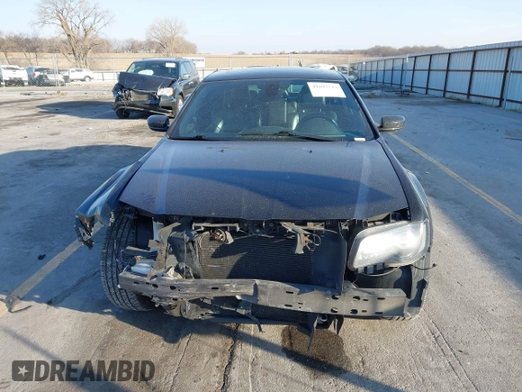 2015 Chrysler 300 with VIN 2C3CCAGG8FH808618, listed as a IAAI auction lot 41695711 with 137,050 mi miles. Bid and sale history available at carsss.com. Image 13.