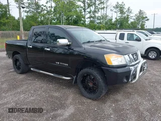 2009 Nissan Titan SE with VIN 1N6BA07D49N318814, listed as a IAAI auction lot 42481150 with 221,448 mi miles and . Bid and sale history available at DreamBid. Image 1.