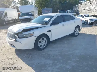 2014 Ford Sedan Police Interceptor with VIN 1FAHP2MK2EG125804, listed as a IAAI auction lot 41297103 with 99,340 mi miles. Bid and sale history available at carsss.com. Image 17.