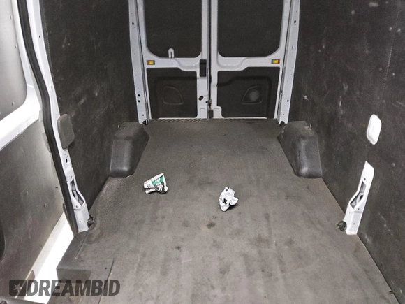 2023 Ford Transit Cargo z VIN 1FTBR1X8XPKB01724, wystawiony jako Copart lot #43828525 z przebiegiem 39 657 mil mil oraz Czysty tytuł • Clean title. Historia ofert i sprzedaży dostępna na DreamBid. Obrazek 10.