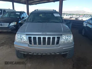 2002 Jeep Grand Cherokee Limited with VIN 1J8GW58J62C165942, listed as a IAAI auction lot 42739339 with 220,677 mi miles and . Bid and sale history available at DreamBid. Image 6.