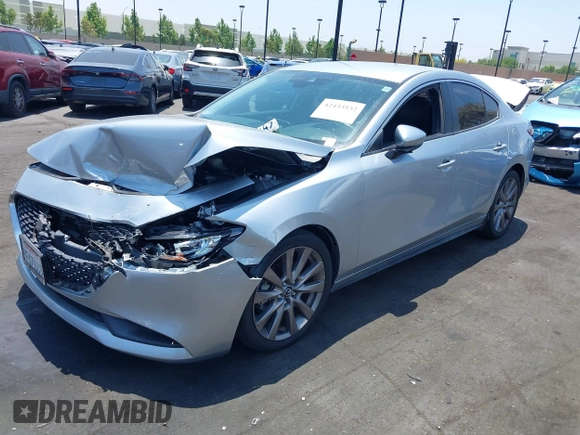 2020 Mazda 3 Select with VIN 3MZBPACL1LM131999, listed as a IAAI auction lot 42433532 with 23,067 mi miles and . Bid and sale history available at DreamBid. Image 18.