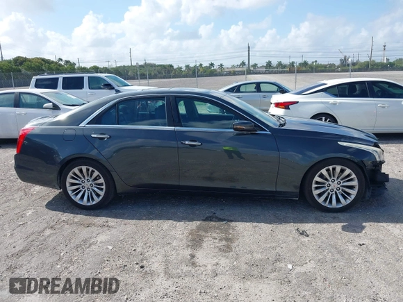 2014 Cadillac CTS Performance RWD with VIN 1G6AS5S36E0151499, listed as a IAAI auction lot 41945902 with 133,858 mi miles and . Bid and sale history available at DreamBid. Image 14.