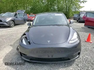 2024 Tesla Model Y Long Range z VIN 7SAYGDEE8RF986258, wystawiony jako Copart lot #58434275 z przebiegiem 59 934 mil mil oraz Szkoda całkowita • Salvage title. Historia ofert i sprzedaży dostępna na DreamBid. Obrazek 15.