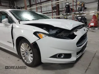 2013 Ford Fusion SE Hybrid with VIN 3FA6P0LU7DR254983, listed as a IAAI auction lot 41883531 with 188,585 mi miles and . Bid and sale history available at carsss.com. Image 6.
