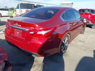 2016 Nissan Altima SR with VIN 1N4AL3AP5GC128614, listed as a IAAI auction lot 41625773 with 123,549 mi miles and . Bid and sale history available at DreamBid. Image 4.