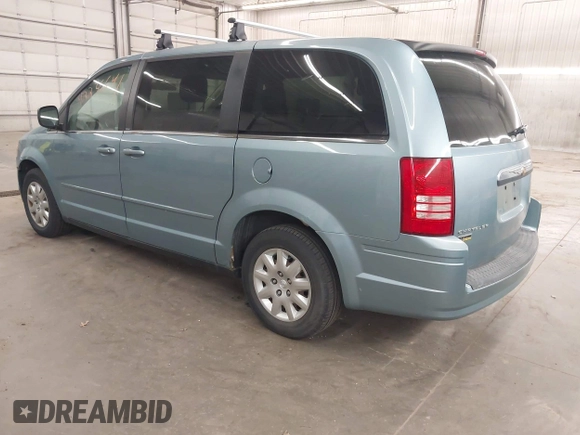 2010 Chrysler Town & Country LX with VIN 2A4RR4DE1AR285996, listed as a IAAI auction lot 42236641 with 165,772 mi miles and . Bid and sale history available at DreamBid. Image 3.