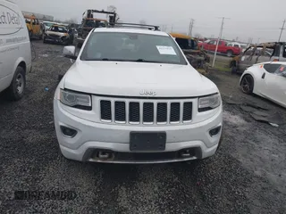 2016 Jeep Grand Cherokee High Altitude with VIN 1C4RJFCG9GC389262, listed as a IAAI auction lot 41272910 with 128,813 mi miles. Bid and sale history available at carsss.com. Image 13.