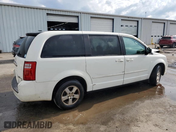 2009 Dodge Grand Caravan SE z VIN 2D8HN44E29R631418, wystawiony jako Copart lot #54954675 z przebiegiem 271 986 mil mil oraz Szkoda całkowita • Salvage title. Historia ofert i sprzedaży dostępna na DreamBid. Obrazek 3.