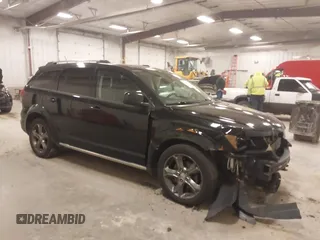 2014 Dodge Journey Crossroad with VIN 3C4PDDGG4ET311521, listed as a IAAI auction lot 41867464 with 128,647 mi miles and . Bid and sale history available at DreamBid. Image 1.
