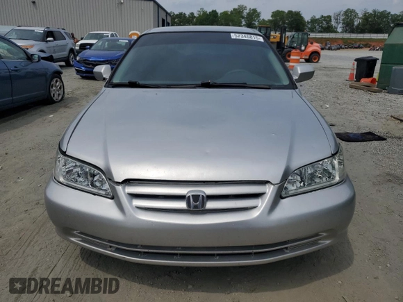 2001 Honda Accord LX z VIN 1HGCG564X1A135855, wystawiony jako Copart lot #57346815 z przebiegiem 235 585 mil mil oraz Szkoda całkowita • Salvage title. Historia ofert i sprzedaży dostępna na DreamBid. Obrazek 5.