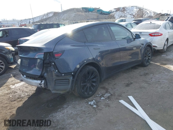 2022 Tesla Model Y Long Range z VIN 7SAYGDEE6NA013757, wystawiony jako IAAI lot #41364867 z przebiegiem 33 621 mil mil oraz . Historia ofert i sprzedaży dostępna na DreamBid. Obrazek 4.