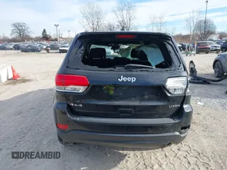 2018 Jeep Grand Cherokee Laredo E with VIN 1C4RJFAG7JC244103, listed as a IAAI auction lot 41260642 with 116,797 mi miles. Bid and sale history available at carsss.com. Image 16.