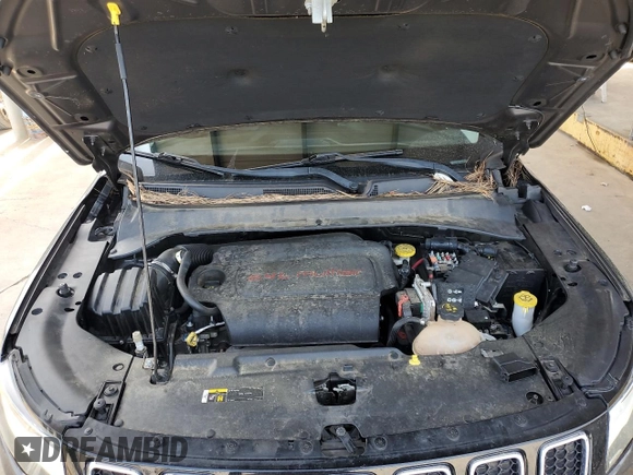 2018 Jeep Compass Limited z VIN 3C4NJCCBXJT361662, wystawiony jako Copart lot #57085315 z przebiegiem 61 815 mil mil oraz Szkoda całkowita • Salvage title. Historia ofert i sprzedaży dostępna na DreamBid. Obrazek 11.
