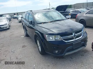 2014 Dodge Journey SXT z VIN 3C4PDCBG1ET115022, wystawiony jako IAAI lot #42462044 z przebiegiem 164 145 mil mil oraz . Historia ofert i sprzedaży dostępna na DreamBid. Obrazek 1.