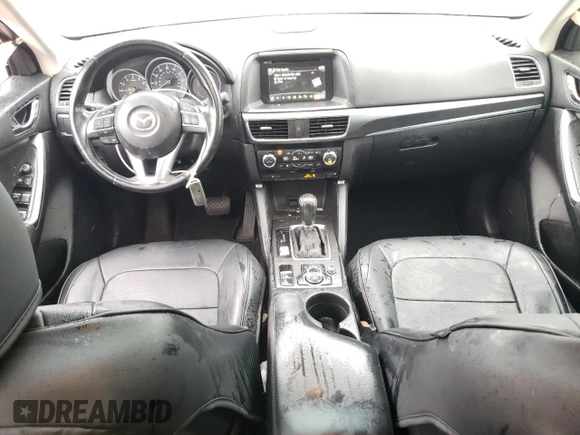 2016 Mazda CX-5 Grand Touring z VIN JM3KE2DY8G0623423, wystawiony jako Copart lot #58599545 z przebiegiem 131 932 mil mil oraz Szkoda całkowita • Salvage title. Historia ofert i sprzedaży dostępna na DreamBid. Obrazek 8.