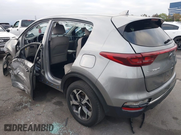 2020 Kia Sportage LX with VIN KNDPM3AC5L7759283, listed as a IAAI auction lot 41901056 with 71,123 mi miles and . Bid and sale history available at carsss.com. Image 3.