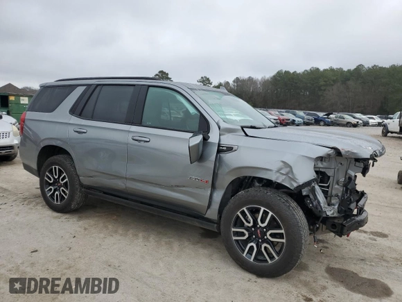 2023 GMC Yukon AT4 with VIN 1GKS2CKD1PR211836, listed as a Copart auction lot 44247245 with 21,756 mi miles and Salvage Title. Bid and sale history available at carsss.com. Image 4.