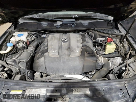 2013 Volkswagen Touareg Sport с VIN WVGEP9BP5DD008301, выставлен на аукционе Copart как лот 85085984 с пробегом 204 735 миль миль и Списание • Salvage title. История ставок и продаж доступна на DreamBid. Изображение 12.