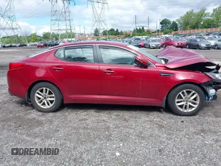 2011 Kia Optima LX z VIN KNAGM4A75B5168564, wystawiony jako IAAI lot #42301373 z przebiegiem Nie podano mil oraz . Historia ofert i sprzedaży dostępna na DreamBid. Obrazek 14.