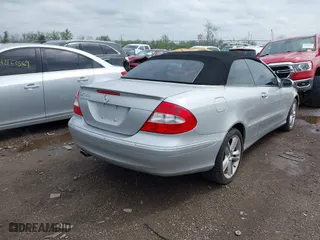2007 Mercedes-Benz CLK-Class 3.5L with VIN WDBTK56F57F207294, listed as a IAAI auction lot 42128925 with 122,162 mi miles. Bid and sale history available at carsss.com. Image 4.