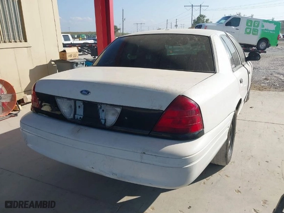 2006 Ford Police Interceptor with VIN 2FAFP71W66X154312, listed as a IAAI auction lot 41305698 with 161,275 mi miles. Bid and sale history available at carsss.com. Image 4.