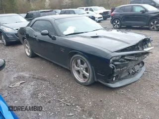 2013 Dodge Challenger R/T z VIN 2C3CDYBT7DH501545, wystawiony jako IAAI lot #41705838 z przebiegiem 85 559 mil mil oraz . Historia ofert i sprzedaży dostępna na DreamBid. Obrazek 1.