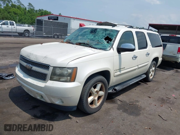 2008 Chevrolet Suburban LTZ z VIN 1GNFC16JX8R252506, wystawiony jako IAAI lot #42402610 z przebiegiem 308 625 mil mil oraz . Historia ofert i sprzedaży dostępna na DreamBid. Obrazek 17.