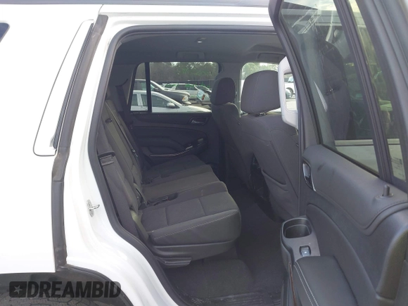 2020 Chevrolet Tahoe LS with VIN 1GNSCAKC6LR197289, listed as a IAAI auction lot 41429866 with 127,071 mi miles and . Bid and sale history available at DreamBid. Image 8.