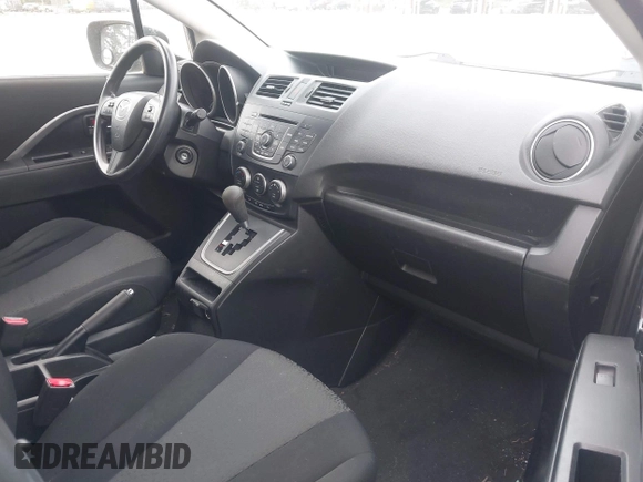 2012 Mazda 5 Sport with VIN JM1CW2BLXC0127258, listed as a IAAI auction lot 42226885 with 112,102 mi miles and . Bid and sale history available at DreamBid. Image 5.