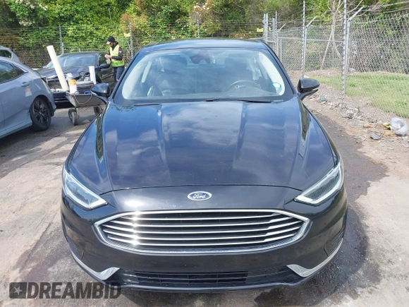 2019 Ford Fusion SEL with VIN 3FA6P0CD5KR182520, listed as a IAAI auction lot 42014190 with 107,028 mi miles and . Bid and sale history available at carsss.com. Image 12.