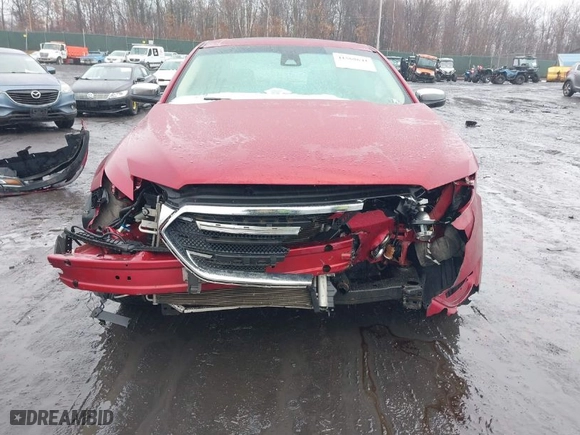2015 Ford Taurus Limited with VIN 1FAHP2J89FG110114, listed as a IAAI auction lot 41568641 with 153,579 mi miles. Bid and sale history available at carsss.com. Image 6.